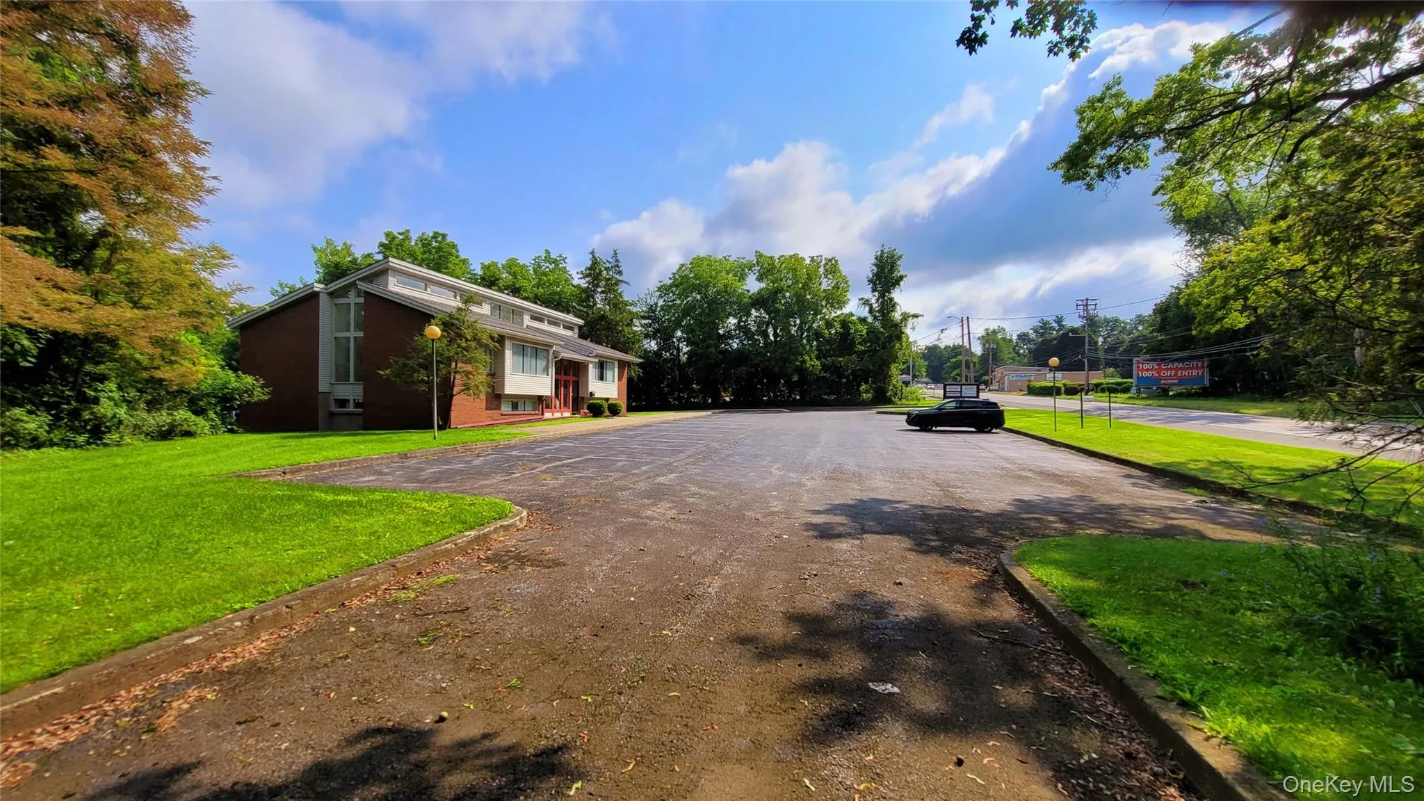 View of street featuring curbs View of street featuring curbs