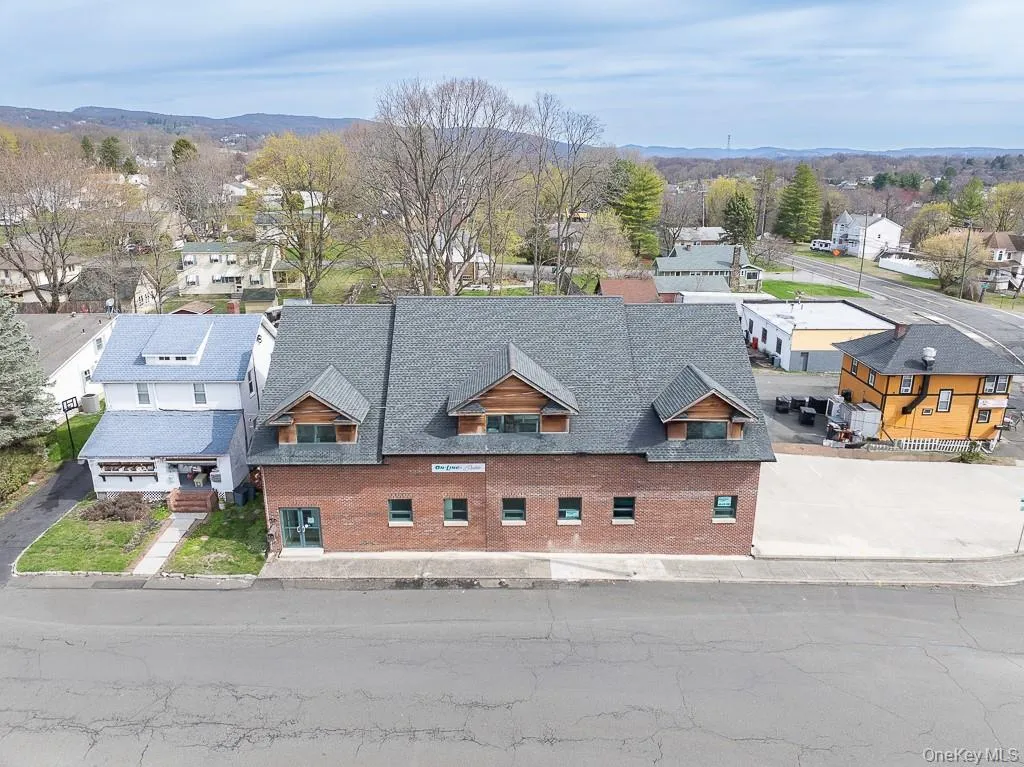 Bird\'s eye view featuring a mountain view and a residential view Bird\'s eye view featuring a mountain view and a residential view