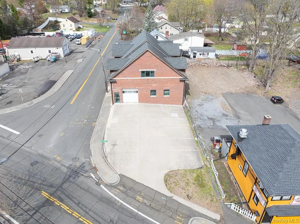 Birds eye view of property with a residential view Birds eye view of property with a residential view