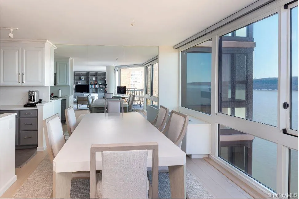 Dining space with light wood finished floors Dining space with light wood finished floors