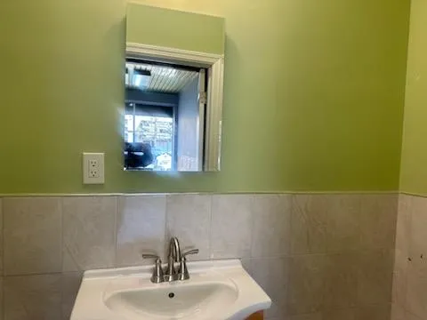 Bathroom featuring vanity Bathroom featuring vanity