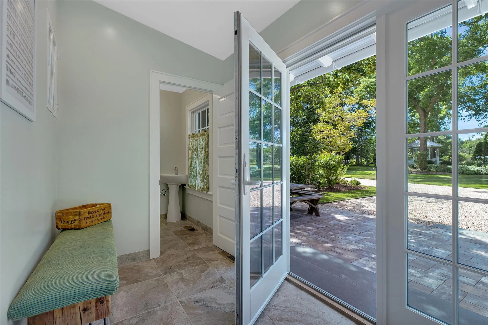mud room, powder room, glass door to rear patio mud room, powder room, glass door to rear patio