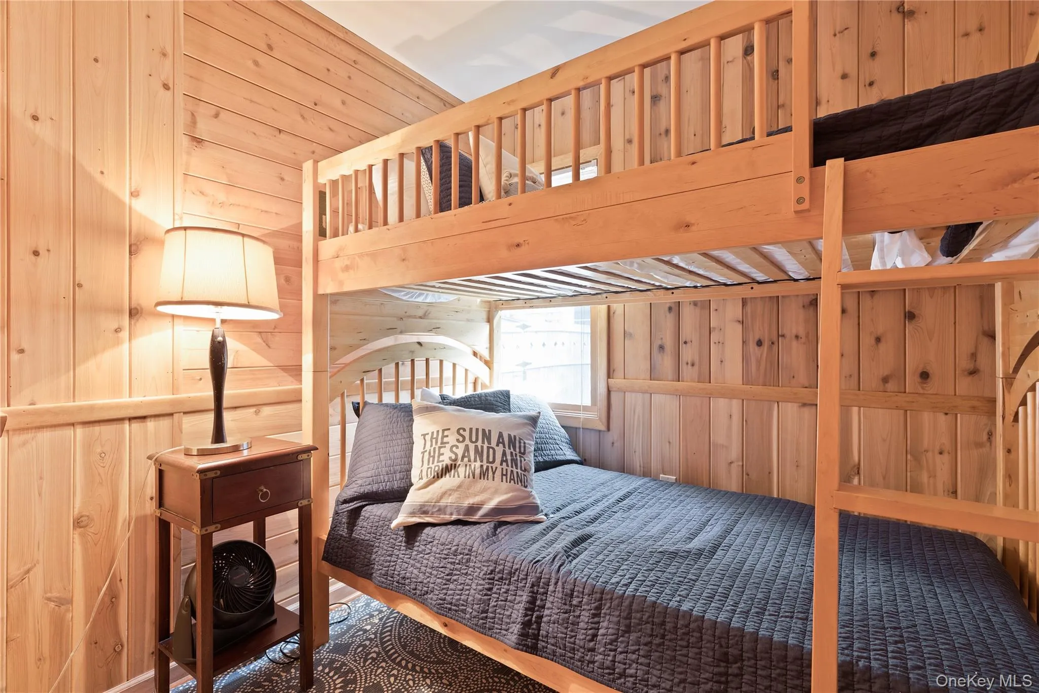 Bedroom with wood walls Bedroom with wood walls