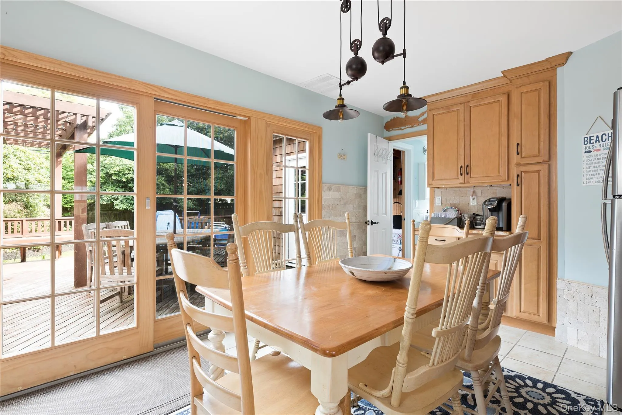 Dining room featuring light tile patterned floors Dining room featuring light tile patterned floors