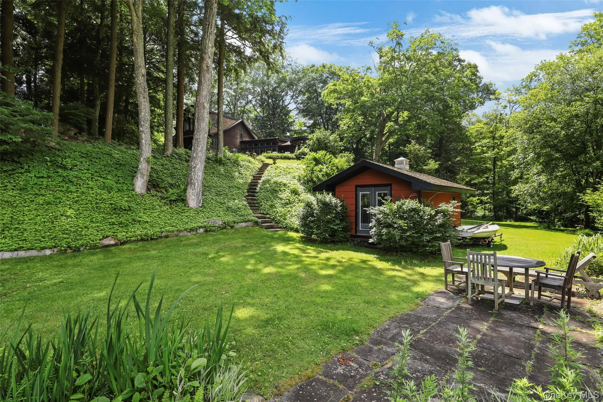 Lakefront area has a small patio perfect for communing with nature and taking in surroundings. Lakefront area has a small patio perfect for communing with nature and taking in surroundings.