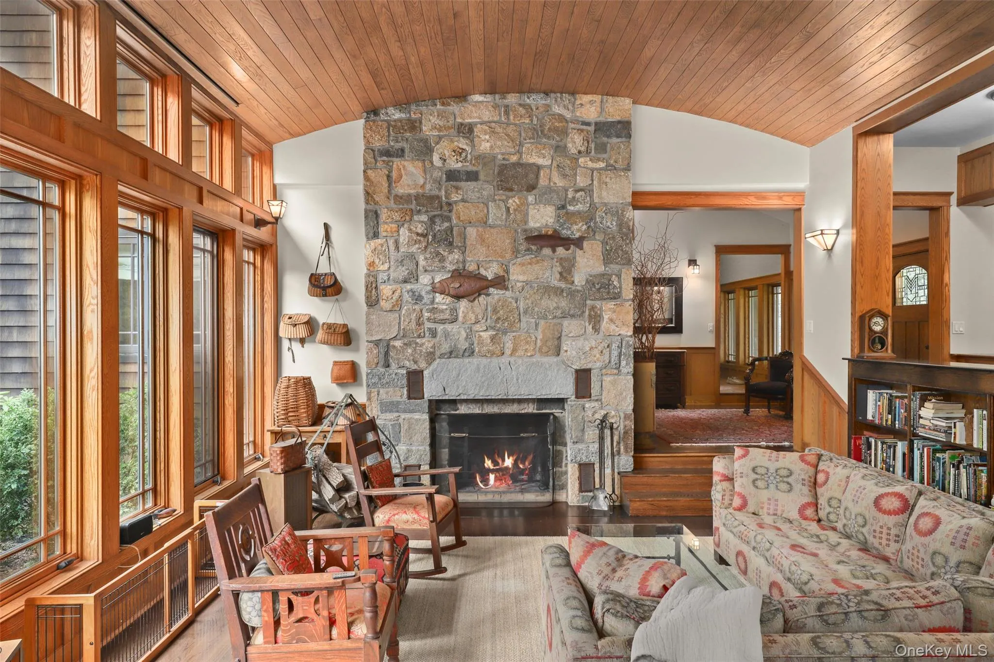 Living area with working fireplace and projector screen T.V. Living area with working fireplace and projector screen T.V.