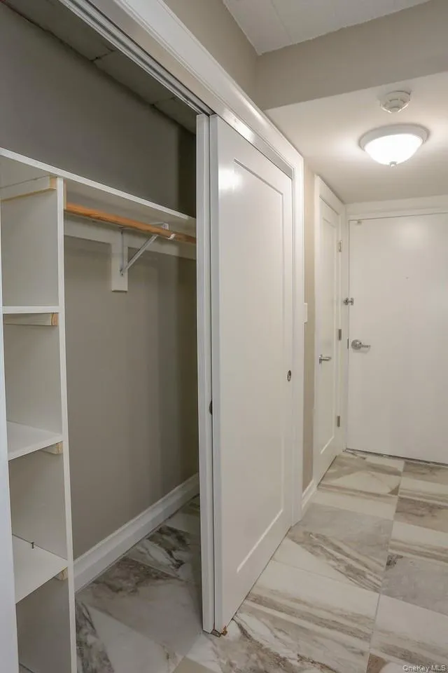 Each suite has two closets There is one open here and a single closet closer to the entrance door. Each suite has two closets There is one open here and a single closet closer to the entrance door.