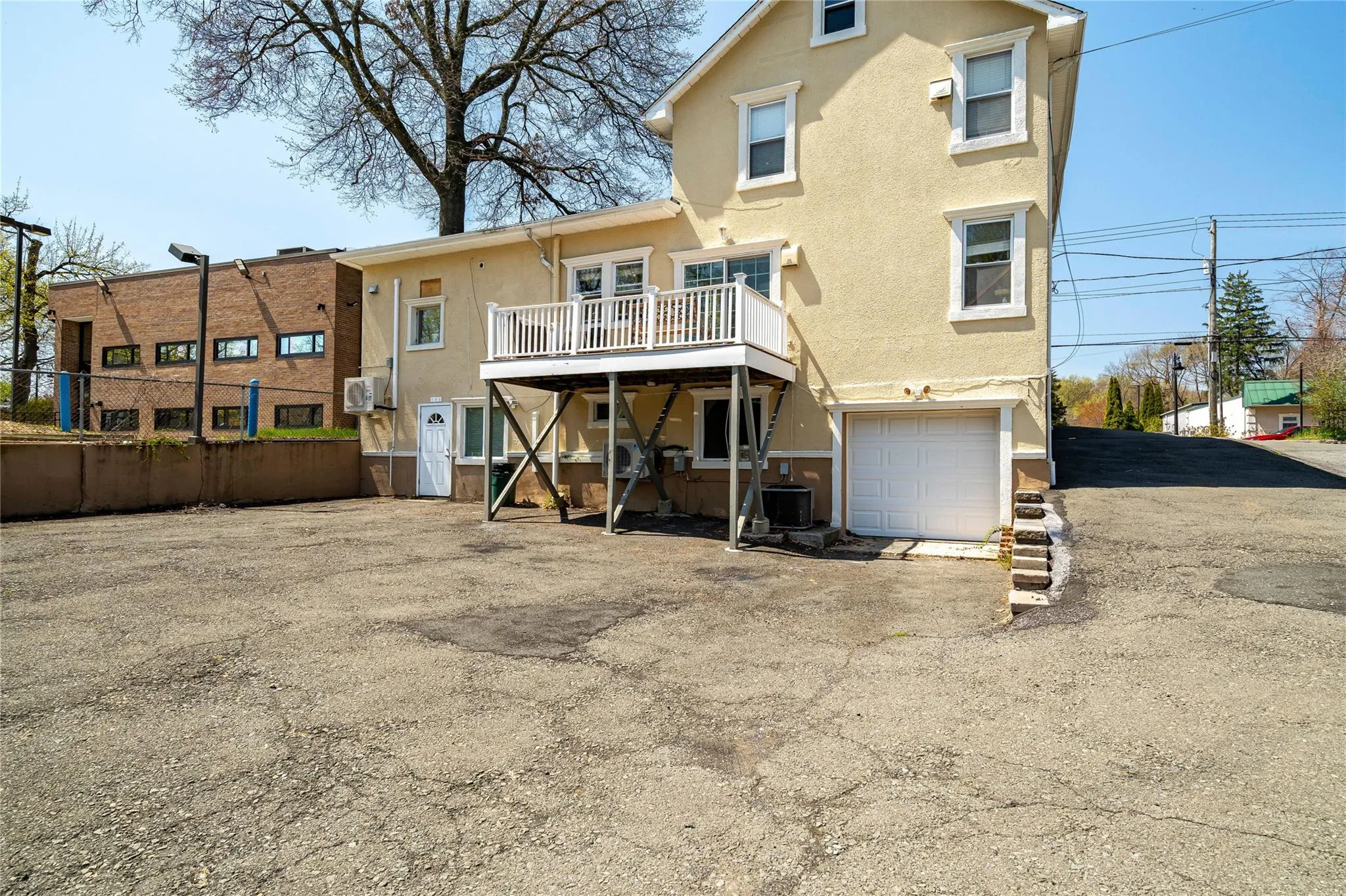 Rear Ground Level Entrance & Private shared parking area Rear Ground Level Entrance & Private shared parking area