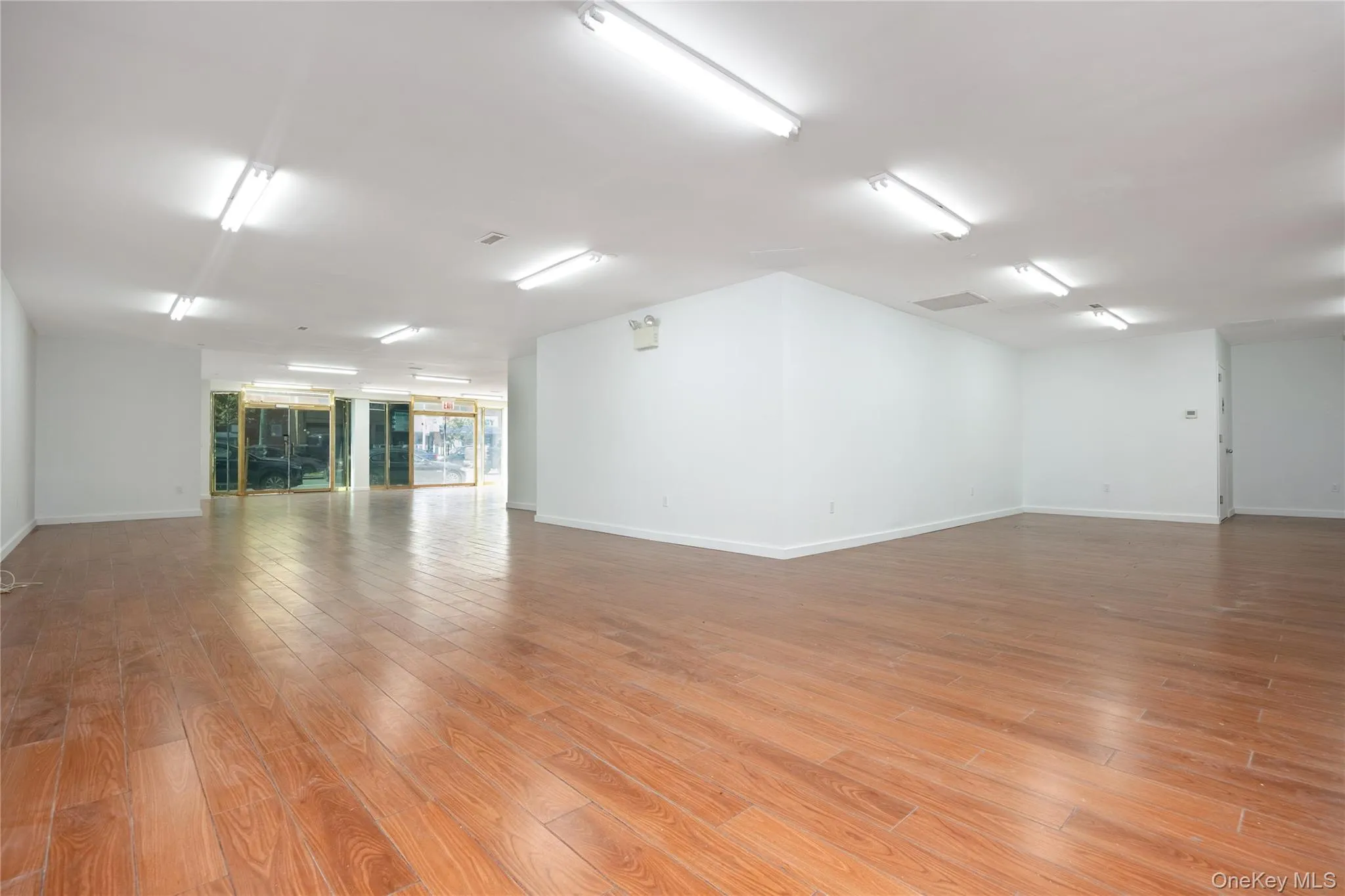 Empty room featuring light wood finished floors Empty room featuring light wood finished floors