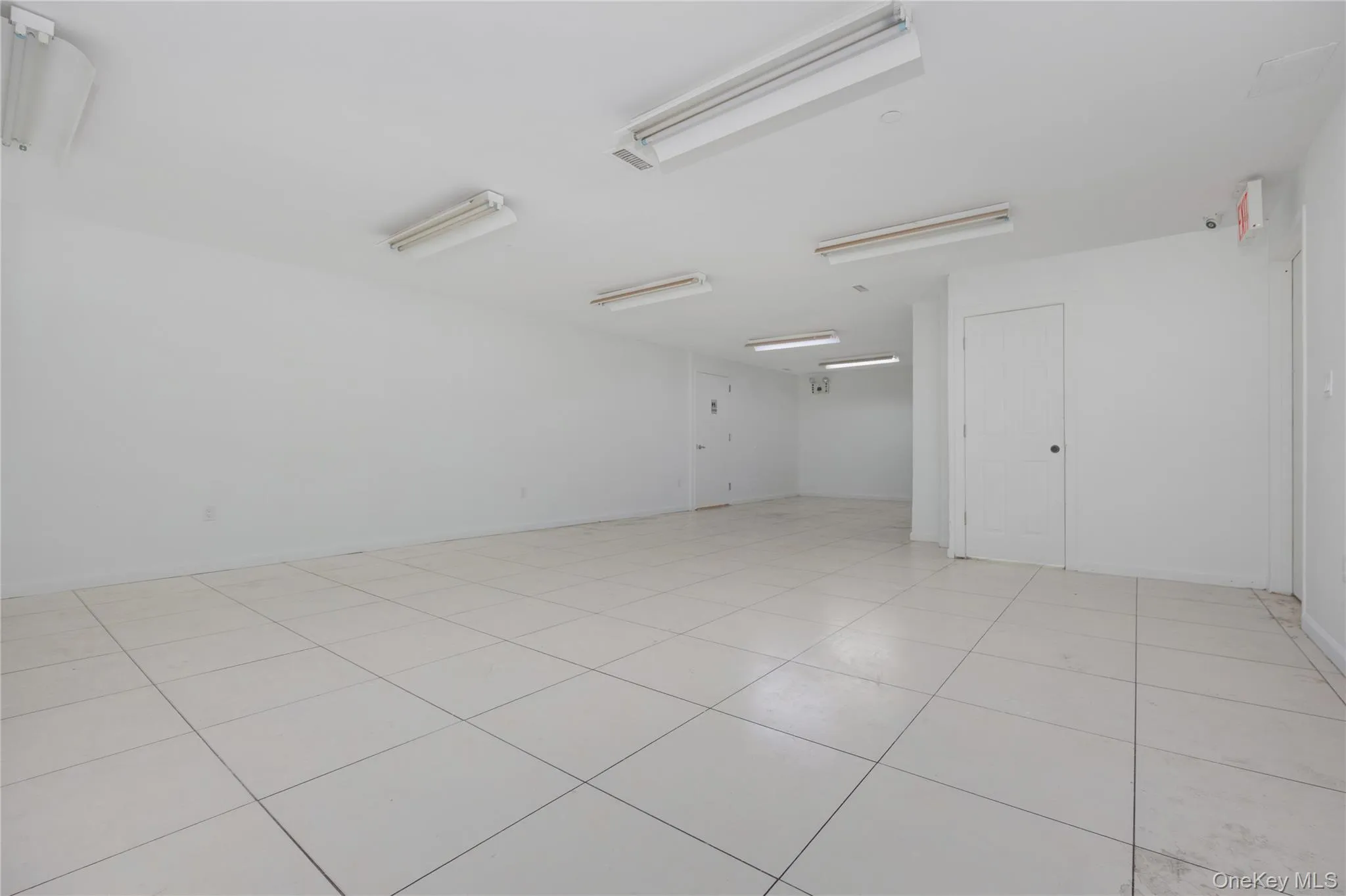 Spare room with light tile patterned flooring Spare room with light tile patterned flooring