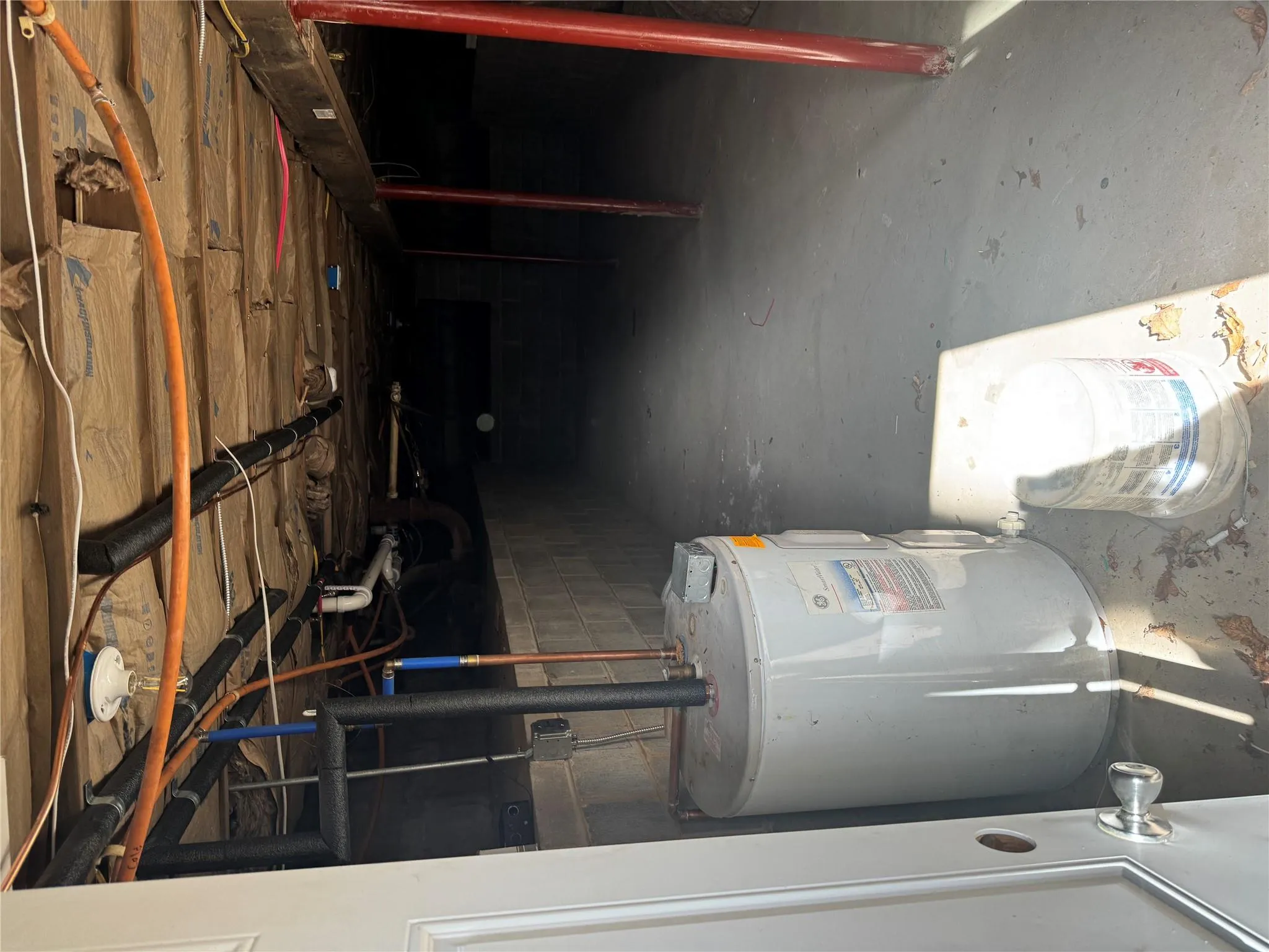 Basement featuring water heater Basement featuring water heater