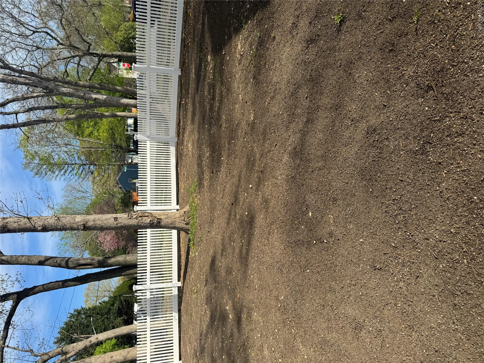 View of yard featuring fence View of yard featuring fence