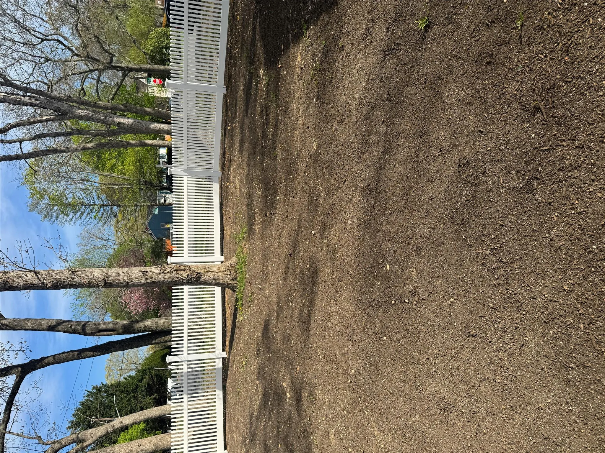 View of yard featuring fence View of yard featuring fence
