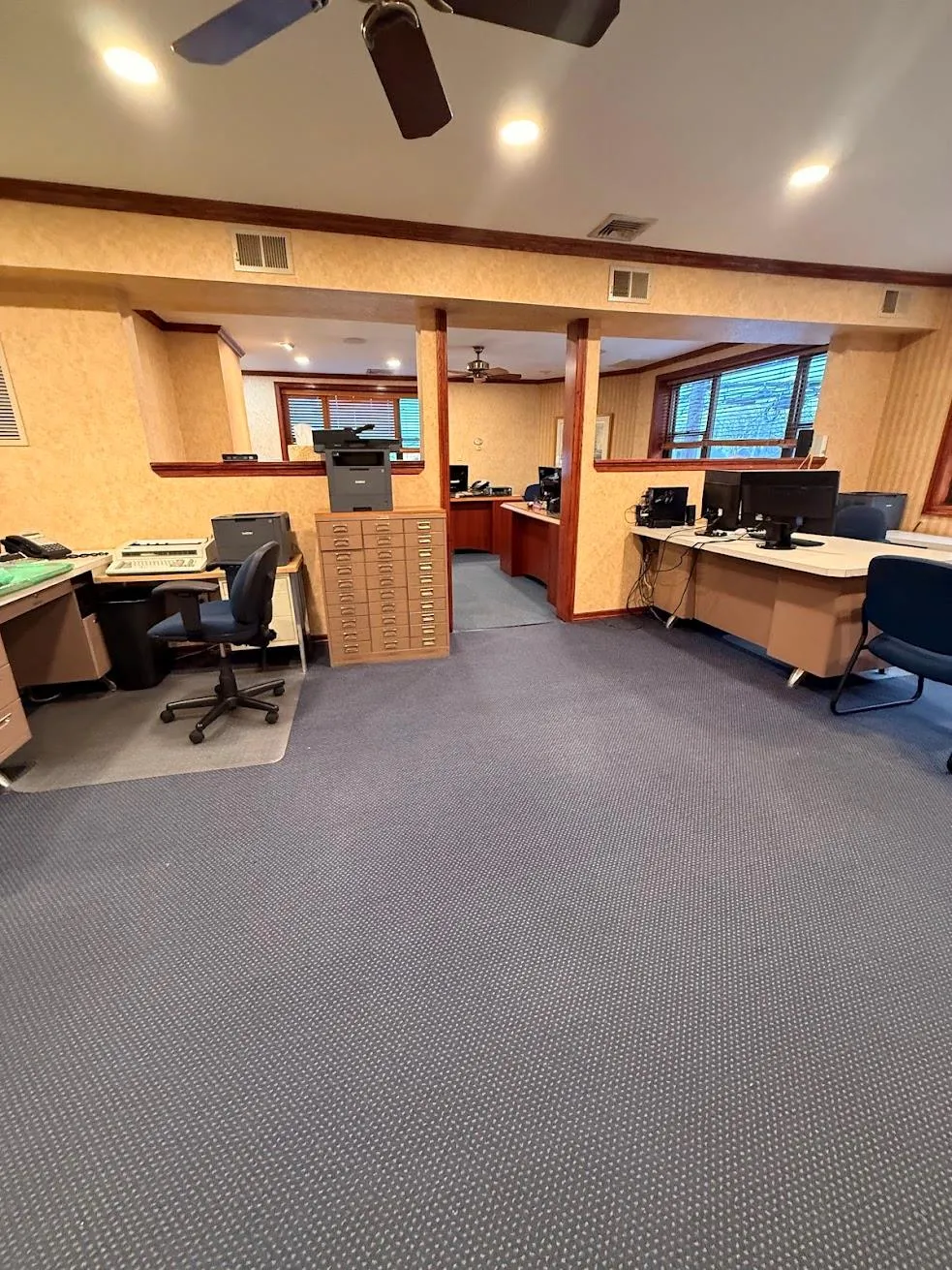 Office featuring ornamental molding, visible vents, carpet, and ceiling fan Office featuring ornamental molding, visible vents, carpet, and ceiling fan