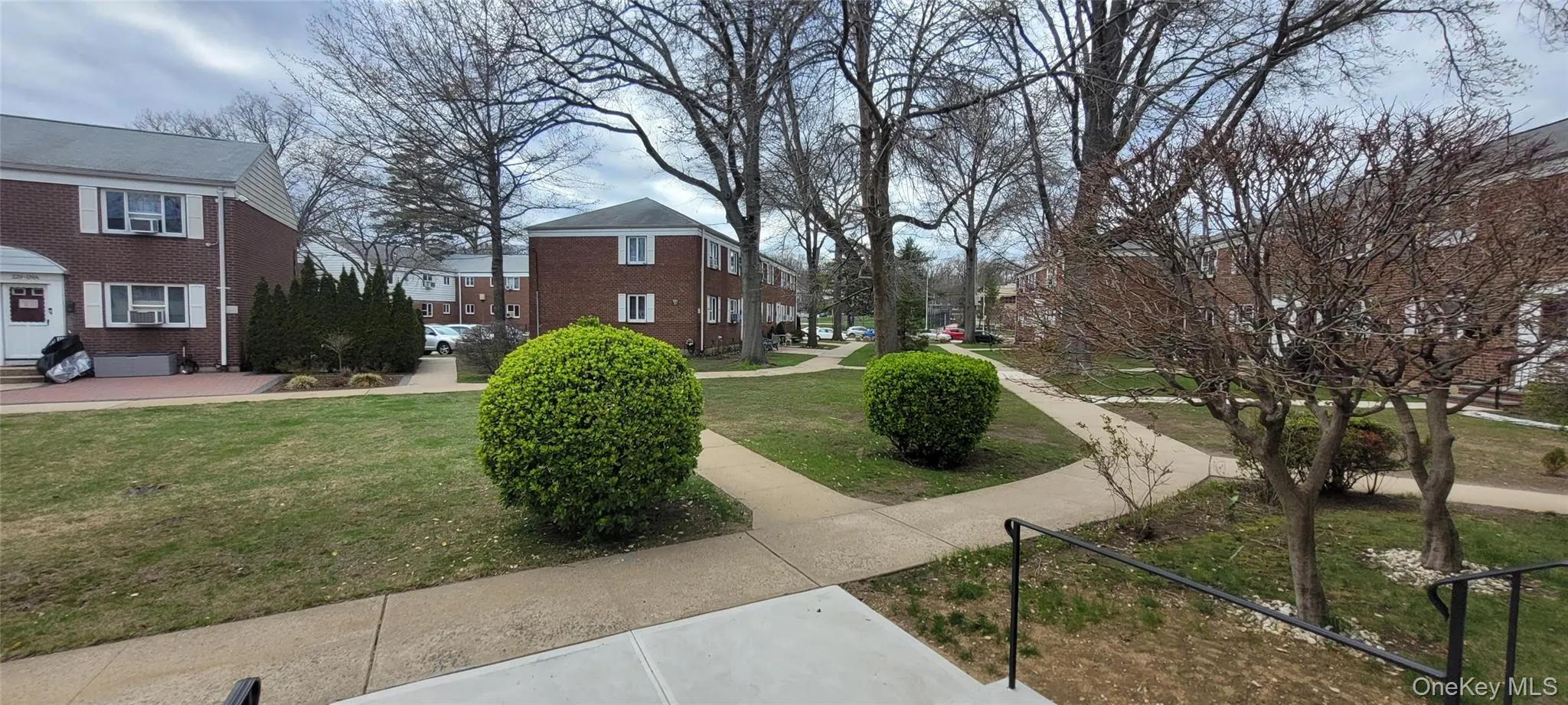 View of home's community featuring a yard, entry steps, and a residential view View of home's community featuring a yard, entry steps, and a residential view