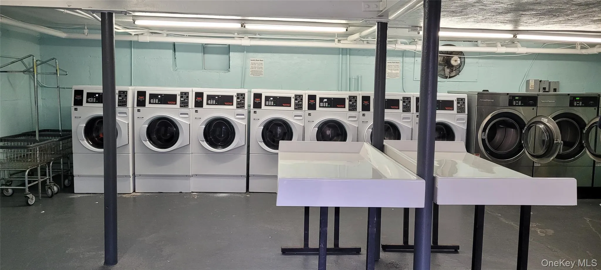 Common laundry area featuring independent washer and dryer Common laundry area featuring independent washer and dryer