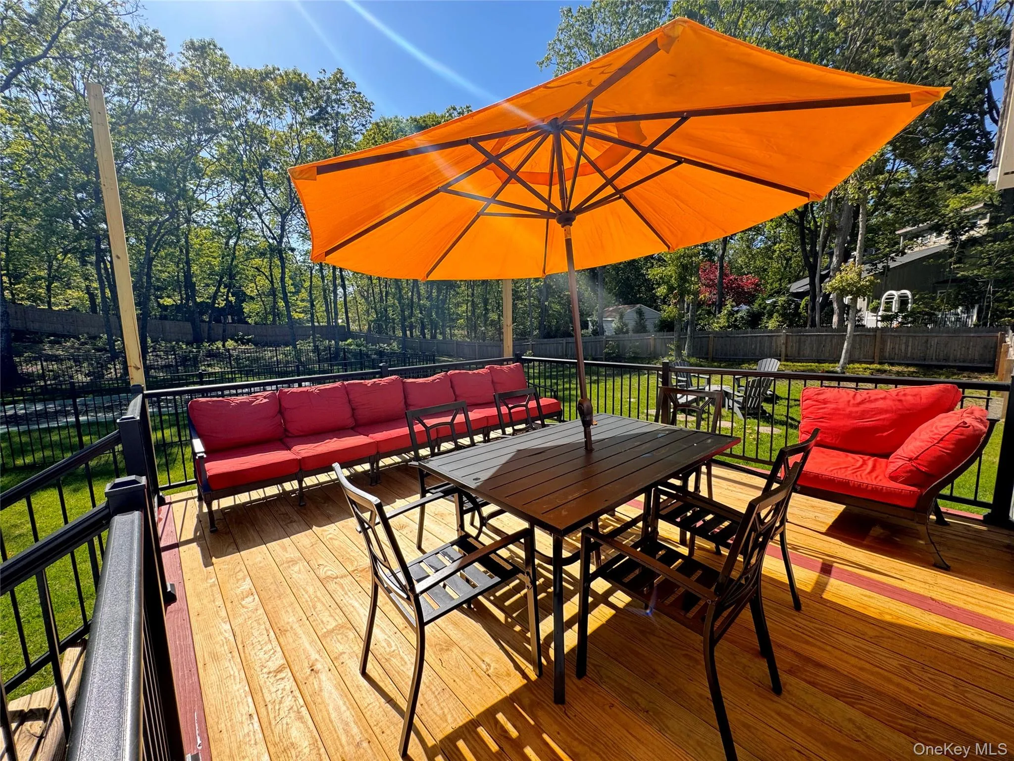 Deck featuring outdoor lounge area and outdoor dining area Deck featuring outdoor lounge area and outdoor dining area