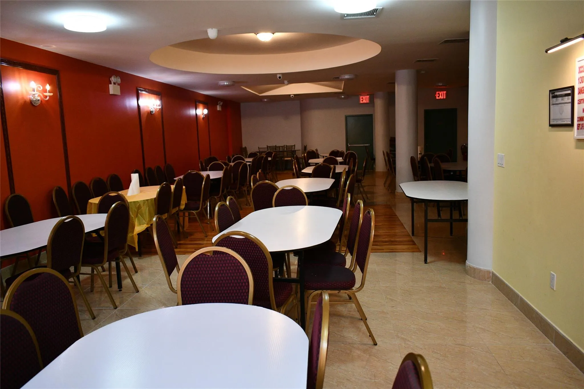 Dining space featuring baseboards, a tray ceiling, and visible vents Dining space featuring baseboards, a tray ceiling, and visible vents