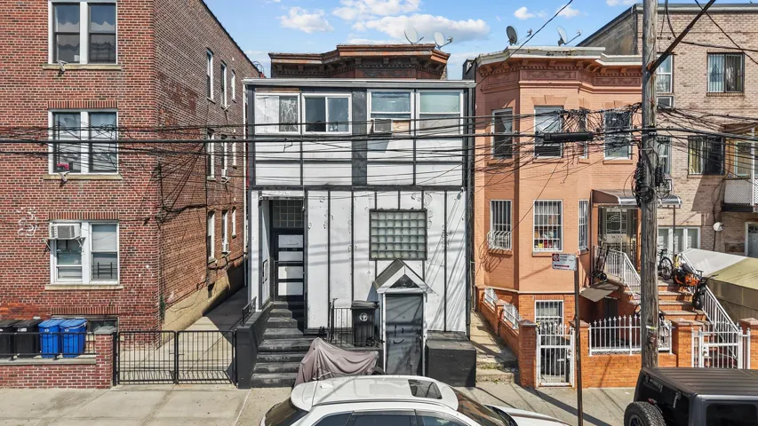 View of front of house with fence