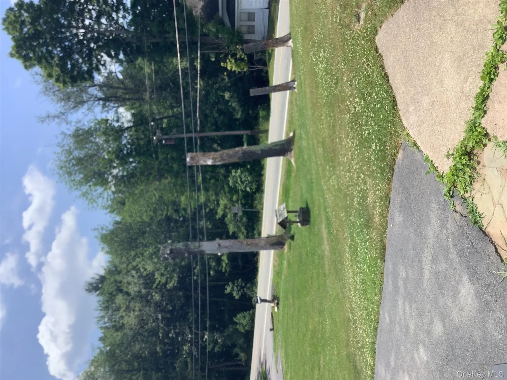 View of home's community with a lawn View of home's community with a lawn