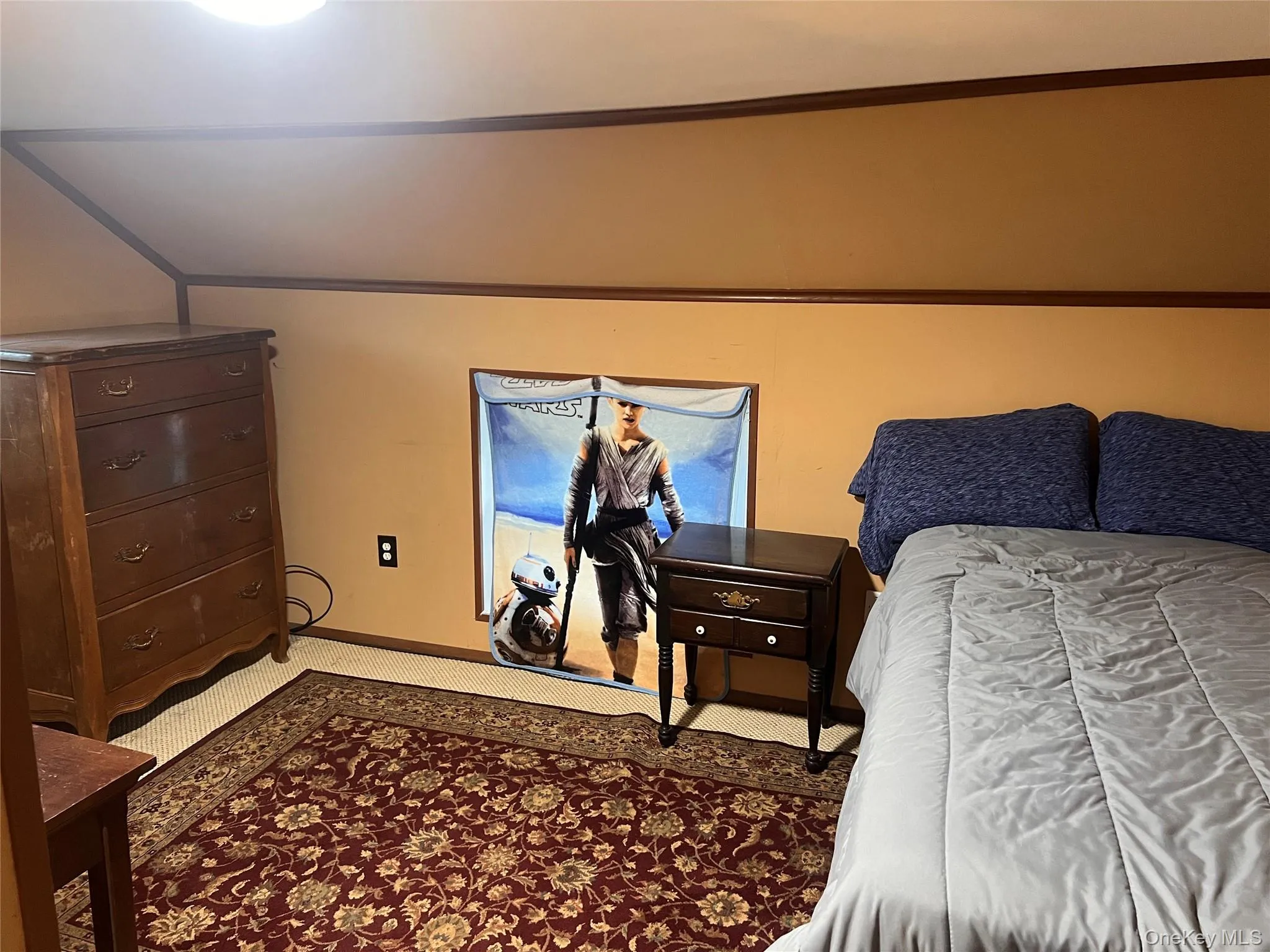 Carpeted bedroom featuring baseboards Carpeted bedroom featuring baseboards