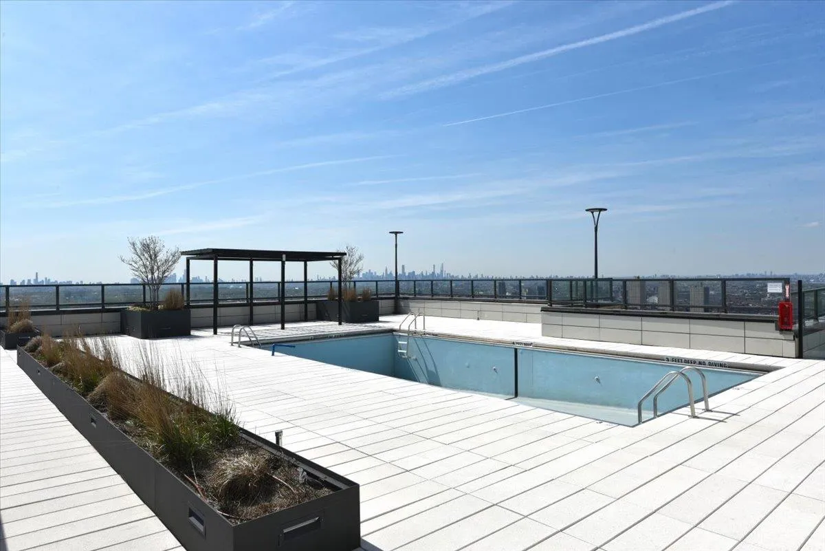 Pool featuring fence Pool featuring fence
