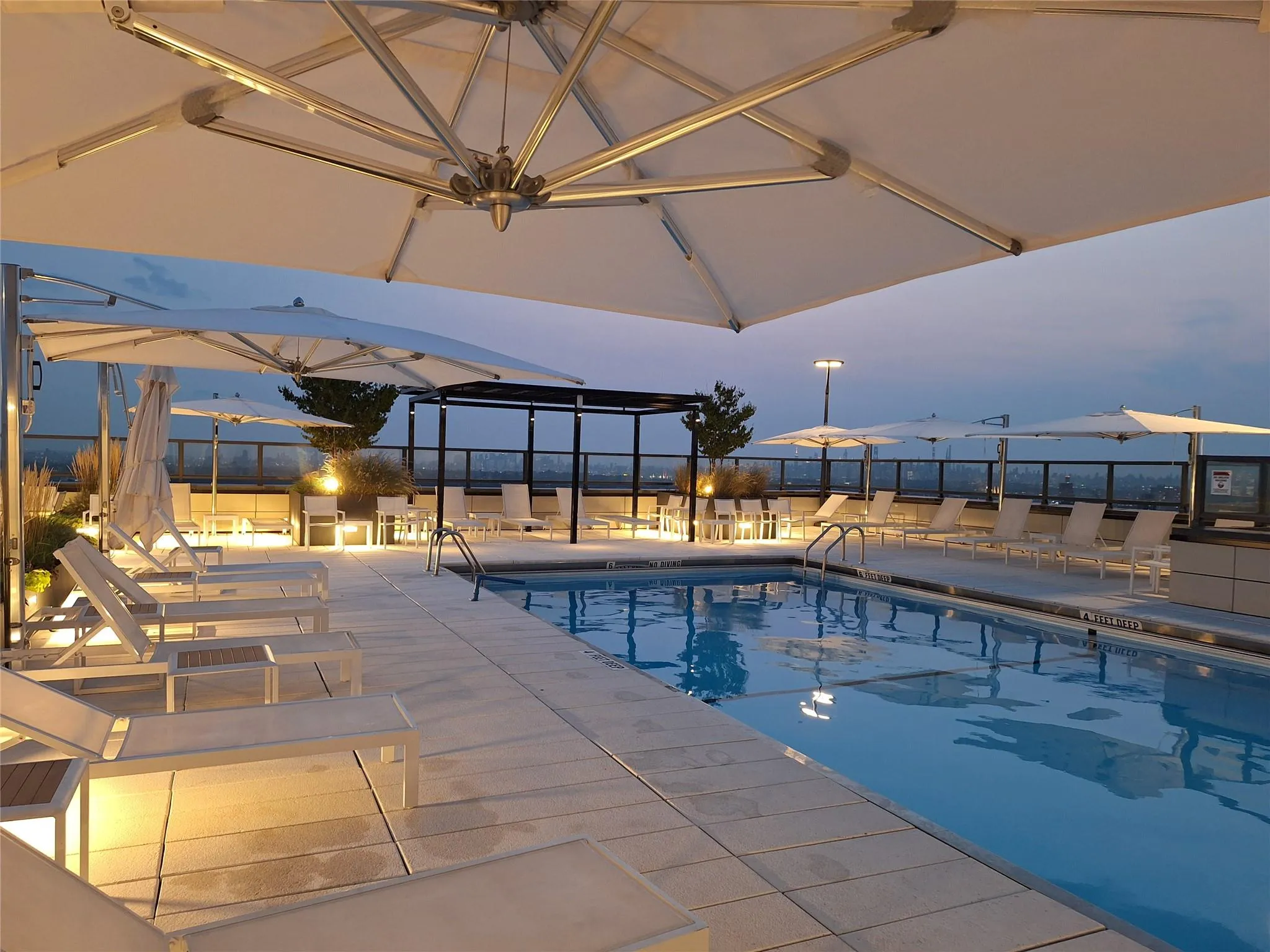 Pool featuring a patio area Pool featuring a patio area