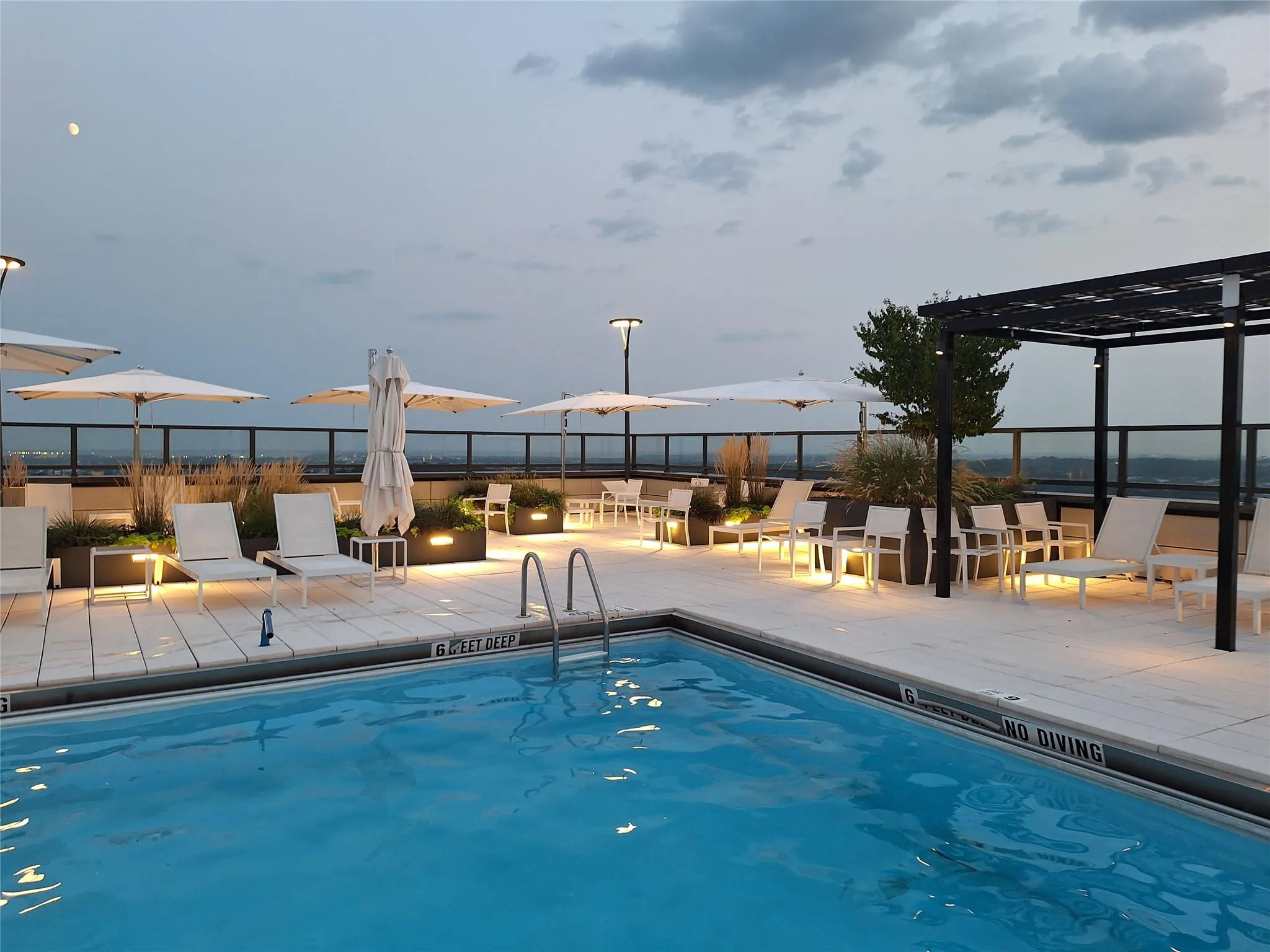 Pool with a pergola, a patio area, and fence Pool with a pergola, a patio area, and fence