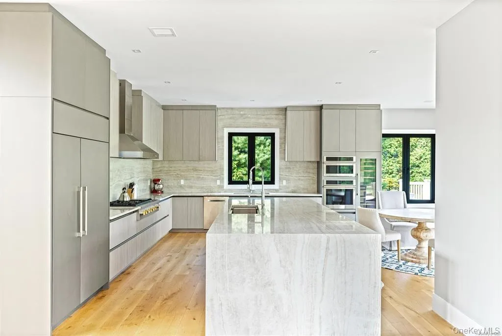 Kitchen with stainless steel appliances and large island Kitchen with stainless steel appliances and large island