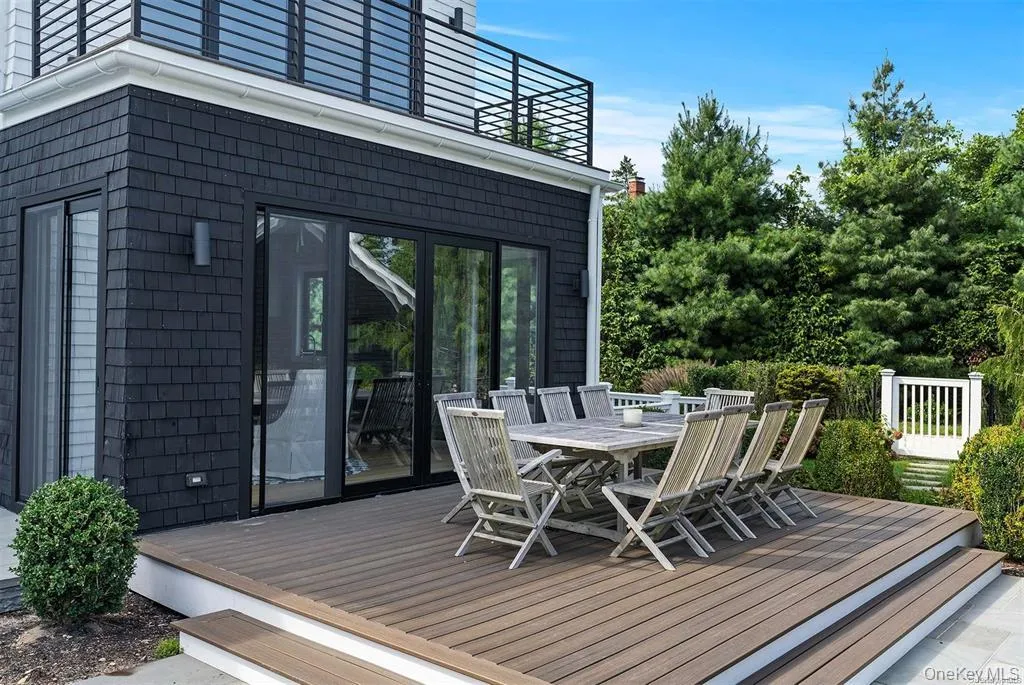 Wooden terrace with outdoor dining space Wooden terrace with outdoor dining space