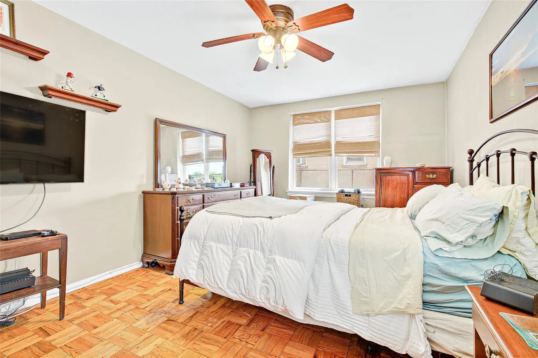 Bedroom with baseboards and ceiling fan Bedroom with baseboards and ceiling fan