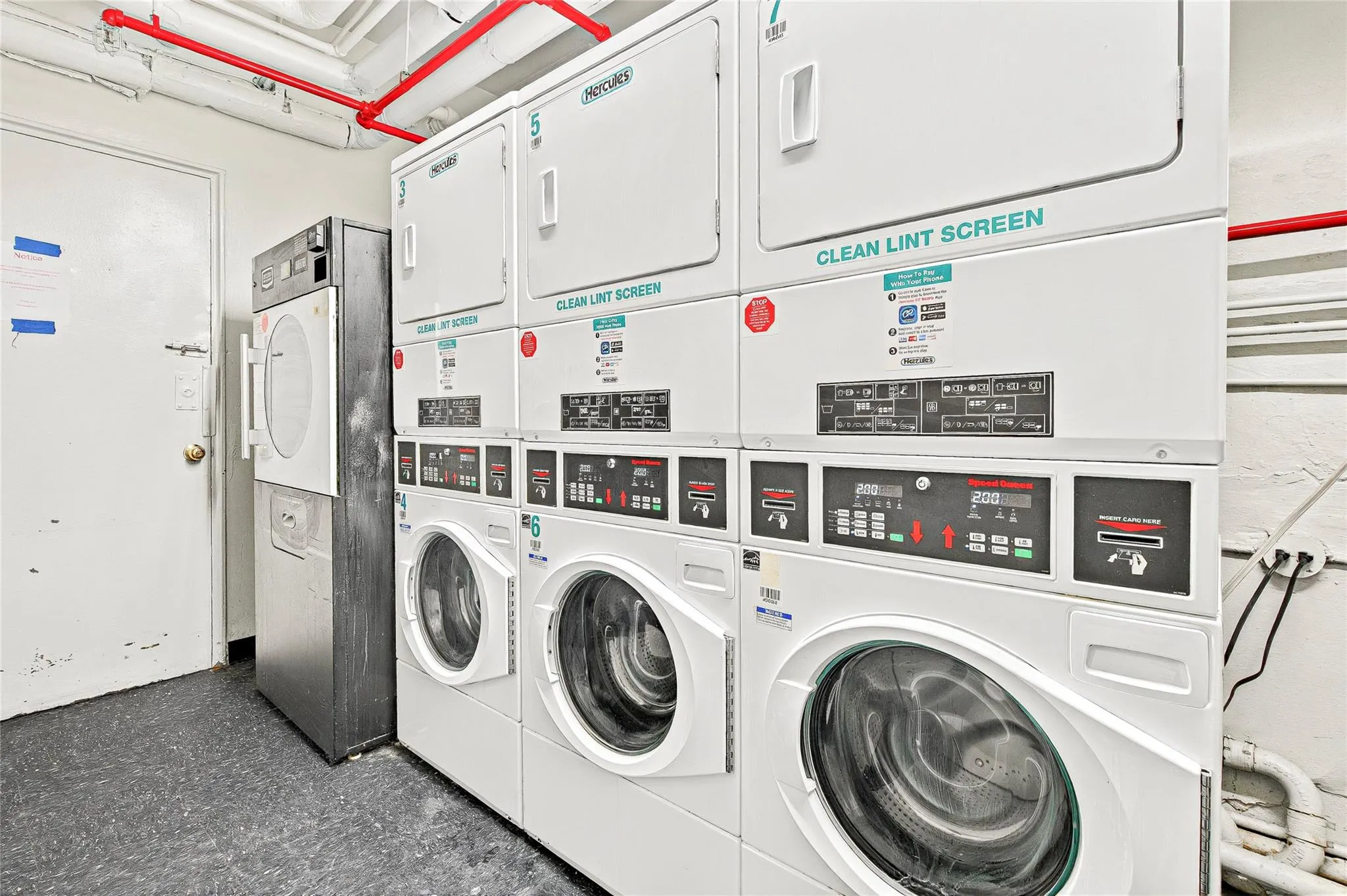 Shared laundry with stacked washing machine and dryer and washing machine and clothes dryer Shared laundry with stacked washing machine and dryer and washing machine and clothes dryer