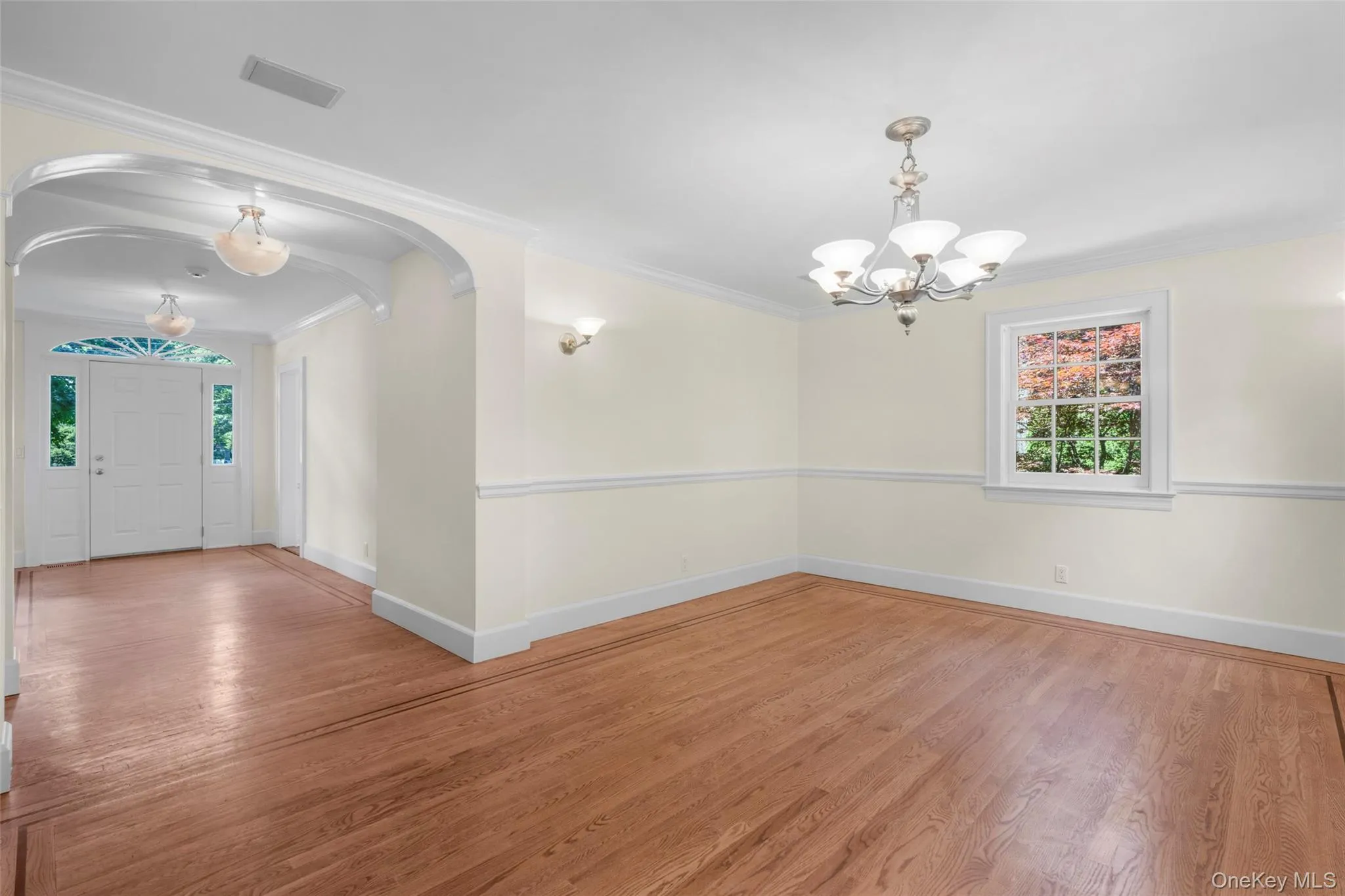 Formal dining room and foyer. Dining room is adjacent to the kitchen. Formal dining room and foyer. Dining room is adjacent to the kitchen.