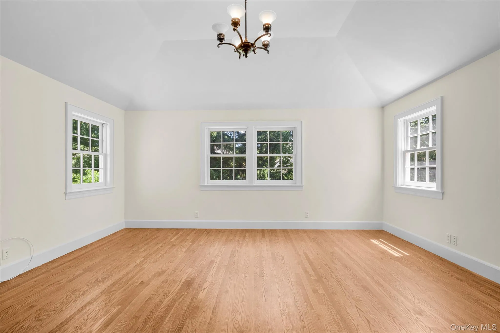 Light filled primary bedroom. Light filled primary bedroom.