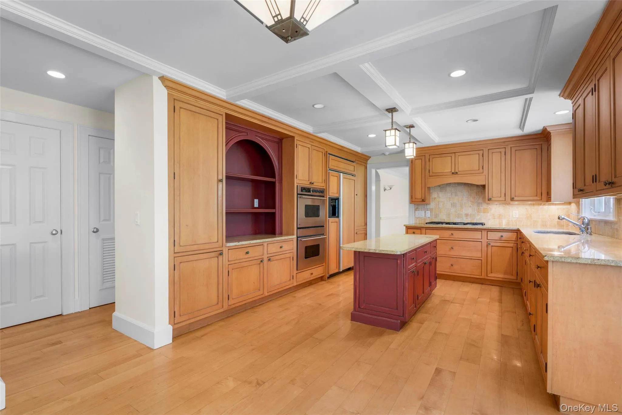Eat in kitchen with entrance to pantry closet and unfinished basement on the left. Eat in kitchen with entrance to pantry closet and unfinished basement on the left.