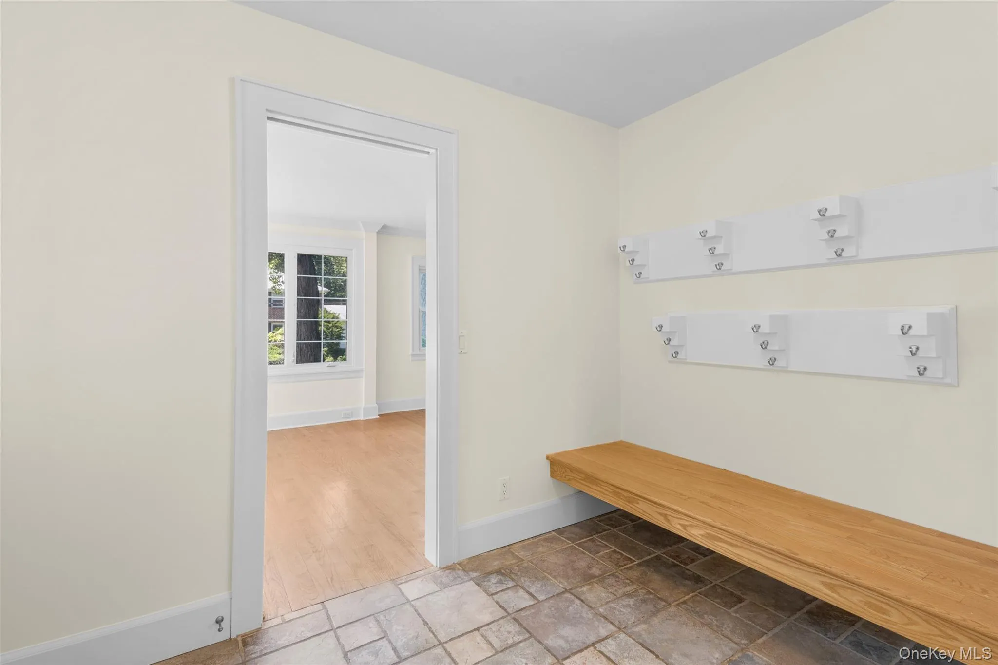 Mudroom adjacent to garage and kitchen. Mudroom adjacent to garage and kitchen.