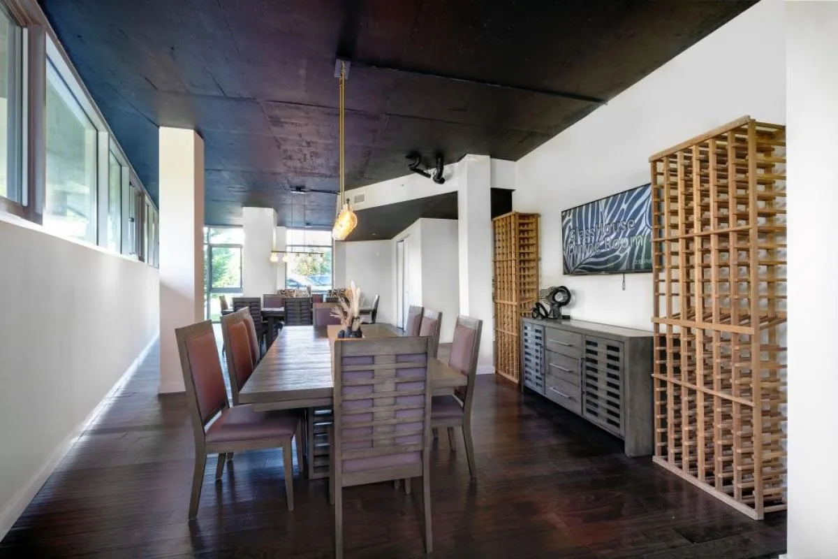 Dining area with dark hardwood / wood-style floors Dining area with dark hardwood / wood-style floors