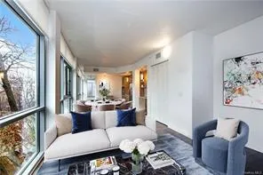 Living room featuring a healthy amount of sunlight Living room featuring a healthy amount of sunlight