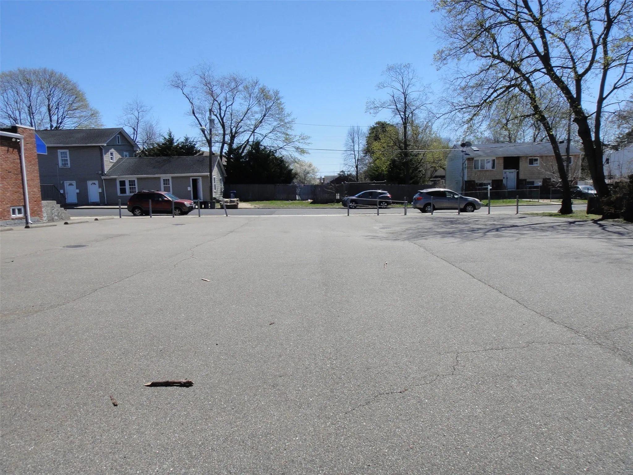 View of asphalt street with a residential view View of asphalt street with a residential view