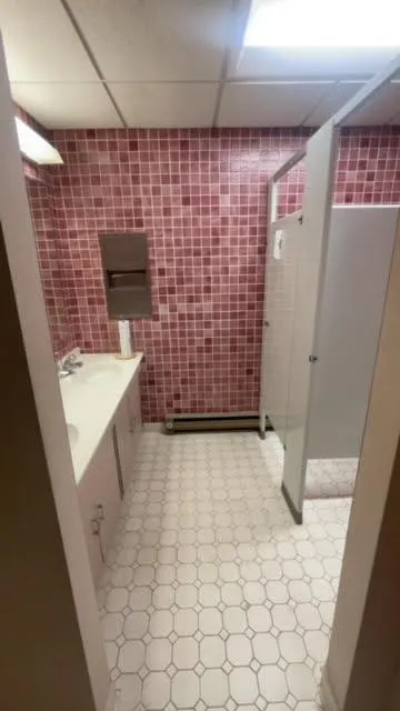 Bathroom featuring two stalls Bathroom featuring two stalls