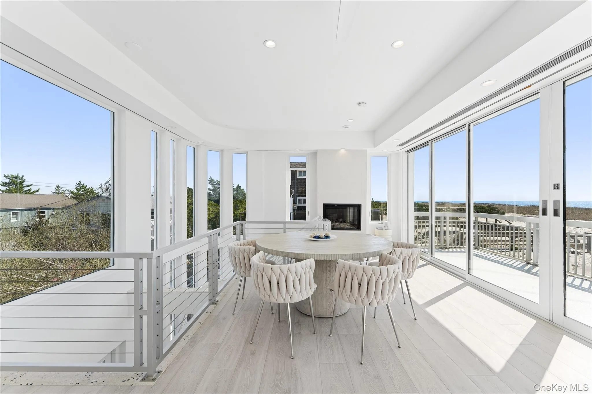 Sunroom featuring a wealth of natural light Sunroom featuring a wealth of natural light