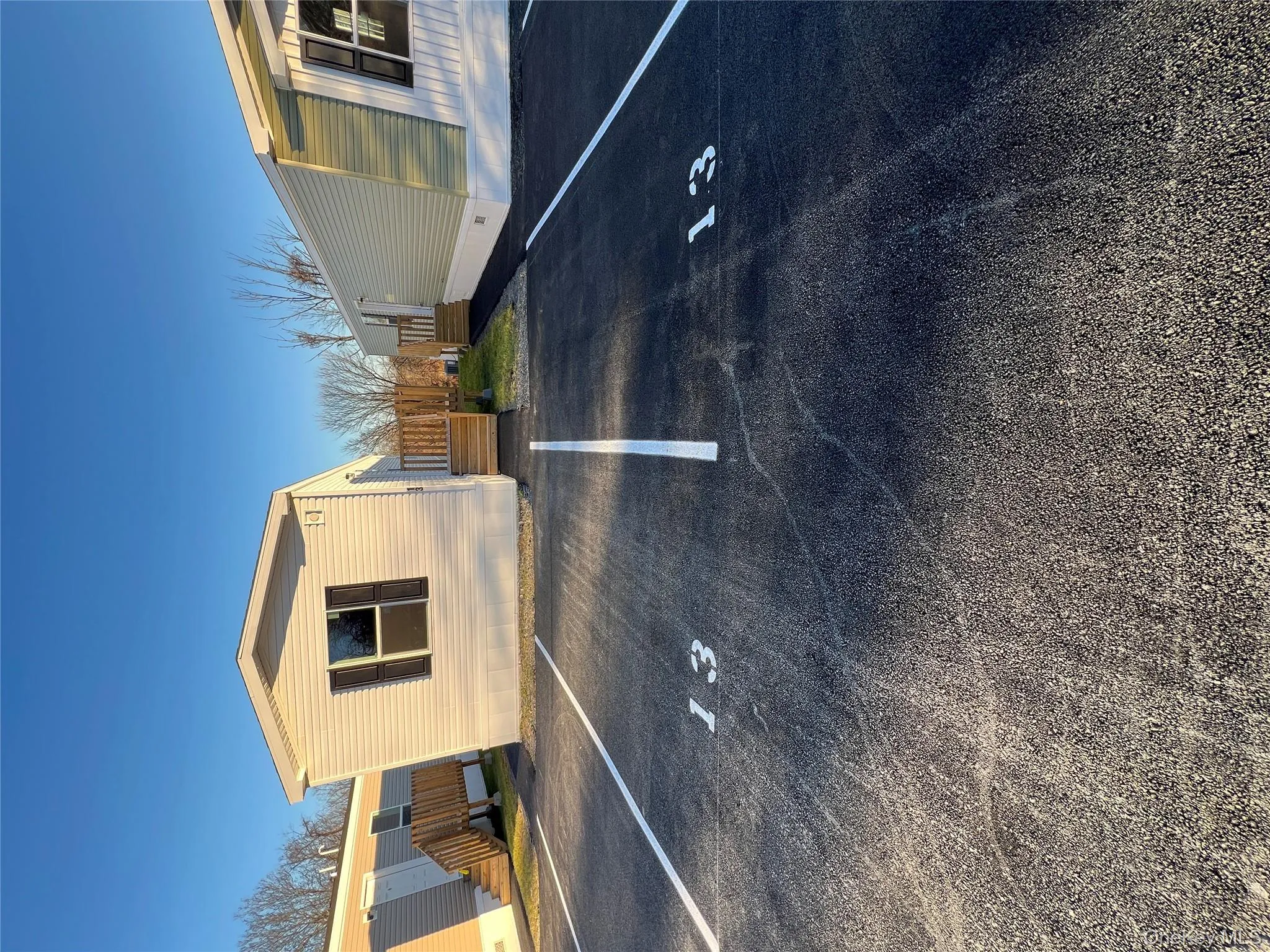 View of uncovered parking lot View of uncovered parking lot