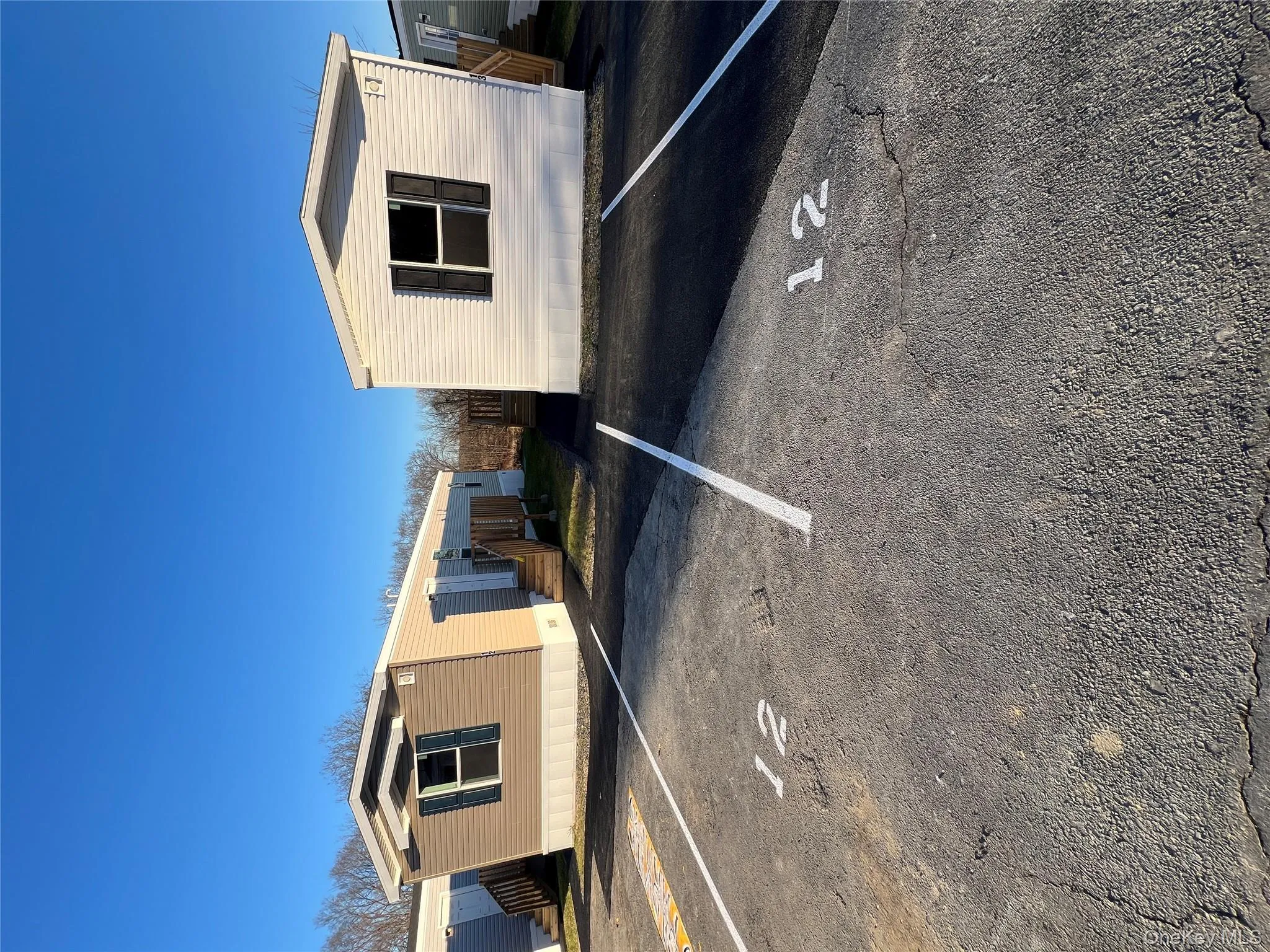 View of uncovered parking lot View of uncovered parking lot