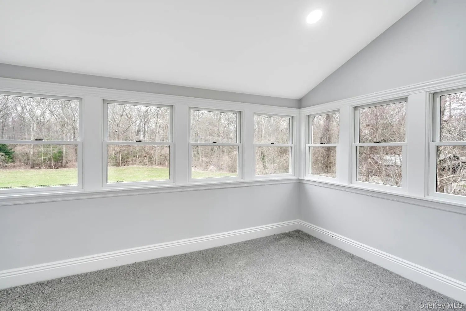 Unfurnished sunroom featuring a healthy amount of sunlight Unfurnished sunroom featuring a healthy amount of sunlight