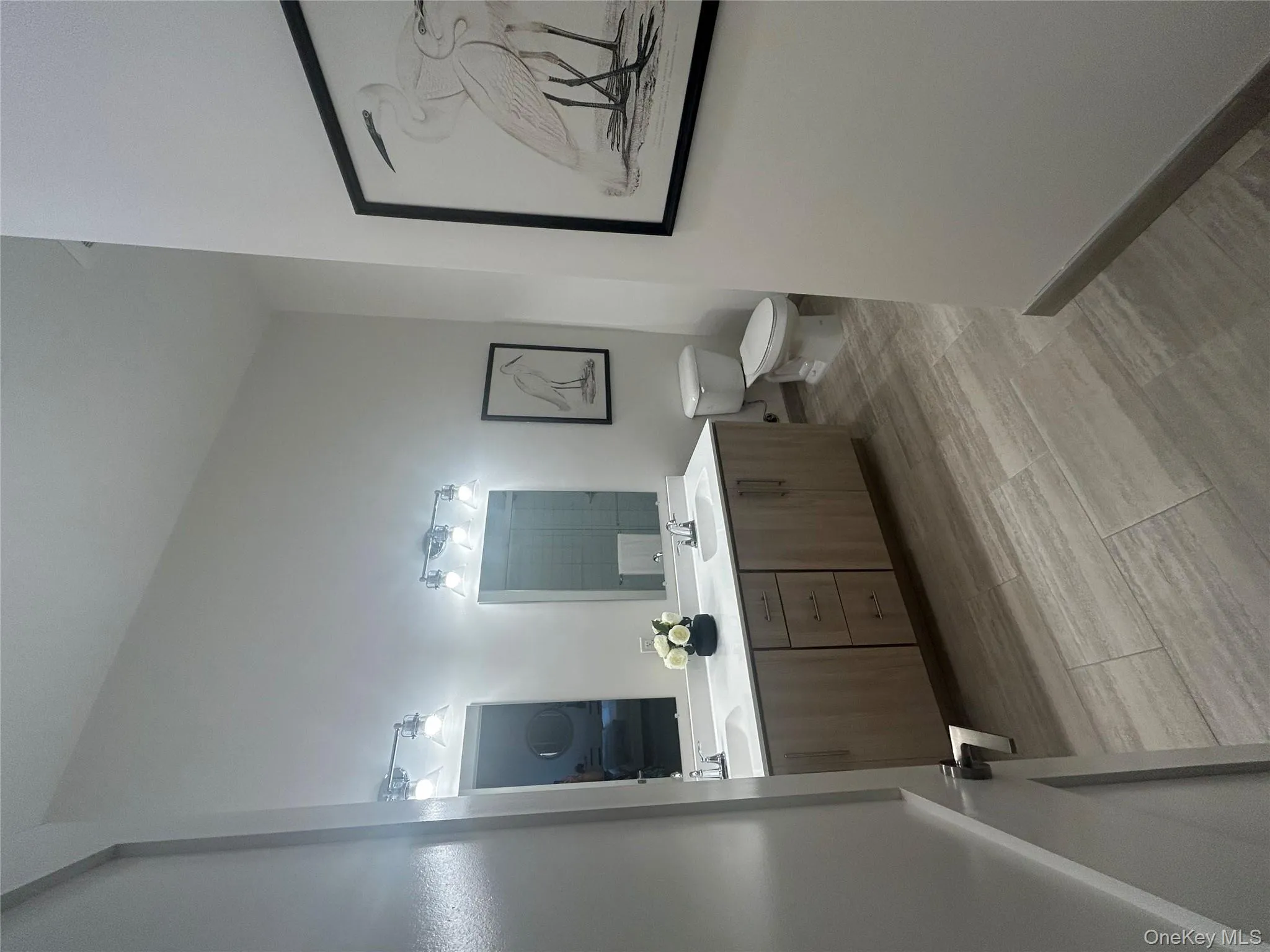 Full bath with double vanity and toilet Full bath with double vanity and toilet