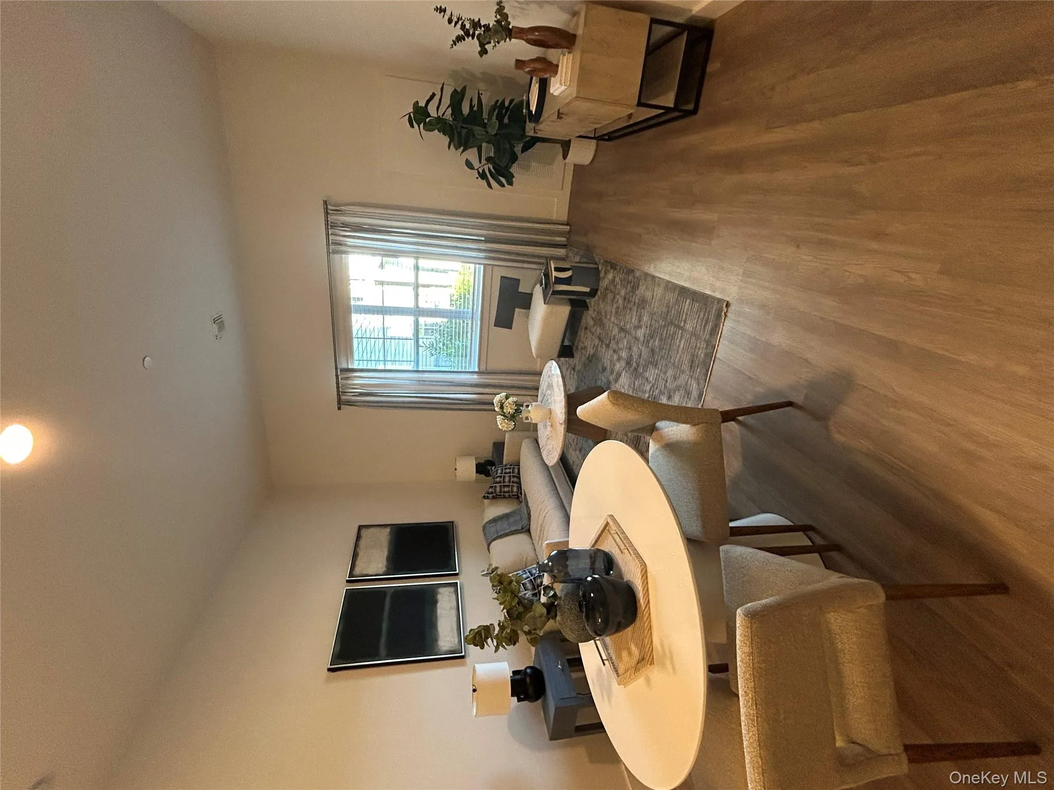 Dining space featuring recessed lighting and wood finished floors Dining space featuring recessed lighting and wood finished floors