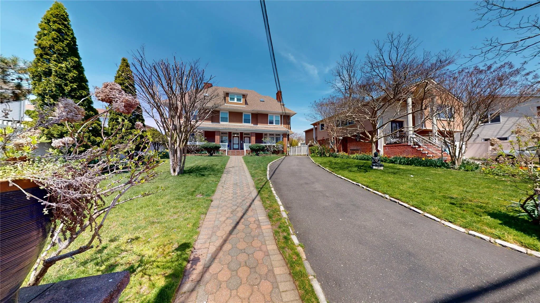 View of front of house featuring a porch and a front lawn View of front of house featuring a porch and a front lawn