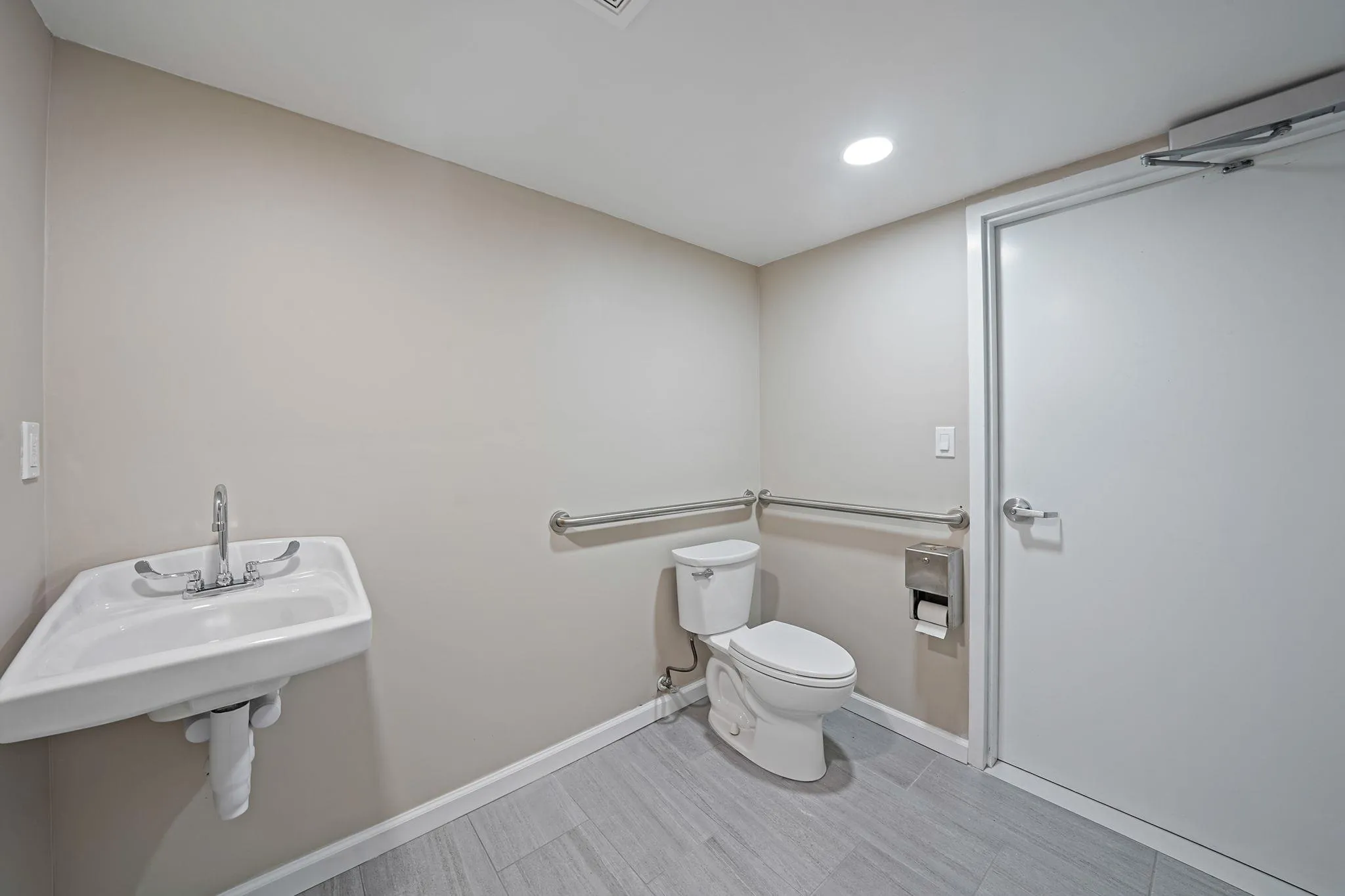 Half bath with toilet, baseboards, and recessed lighting Half bath with toilet, baseboards, and recessed lighting