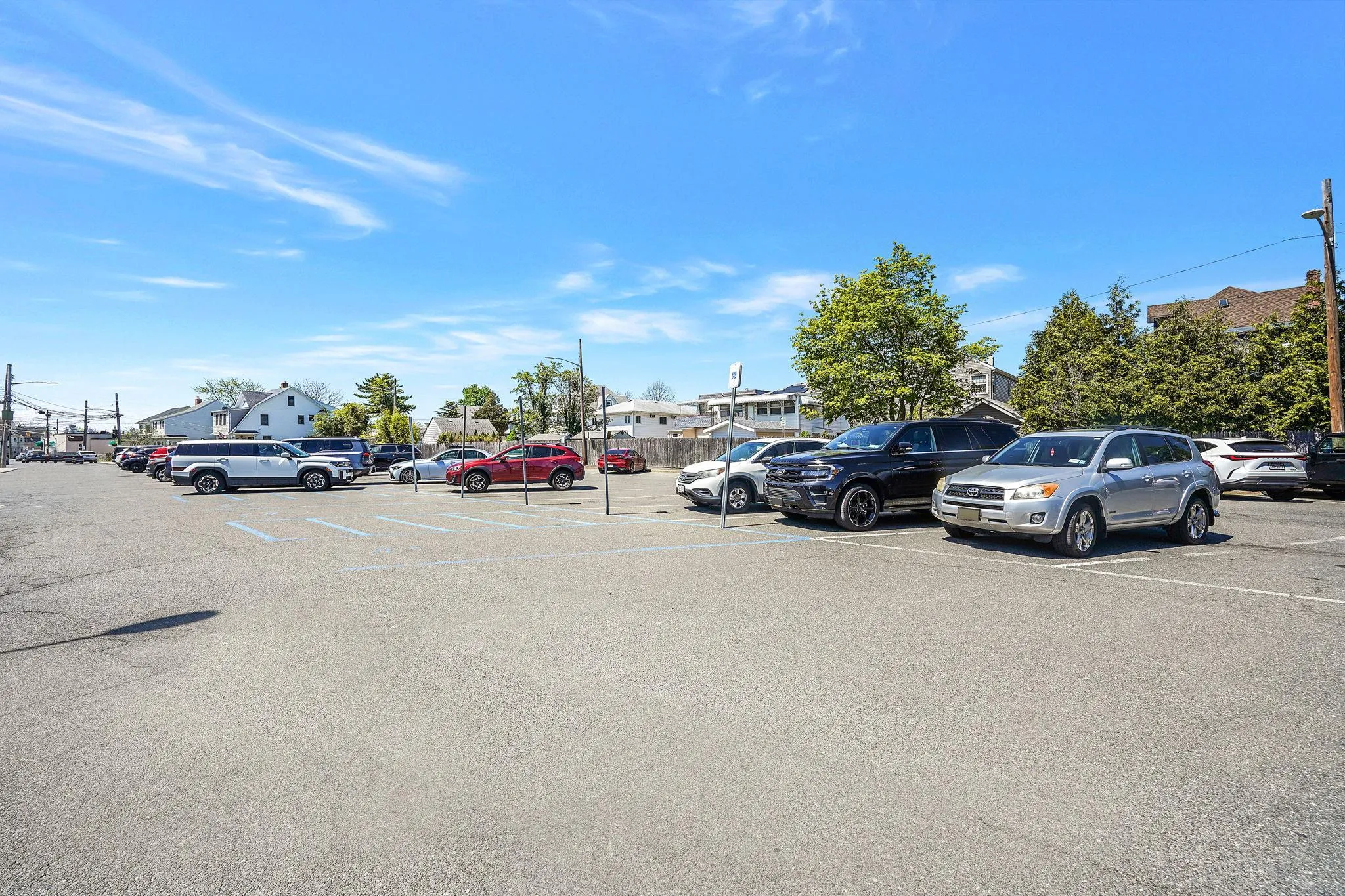 View of uncovered parking lot View of uncovered parking lot