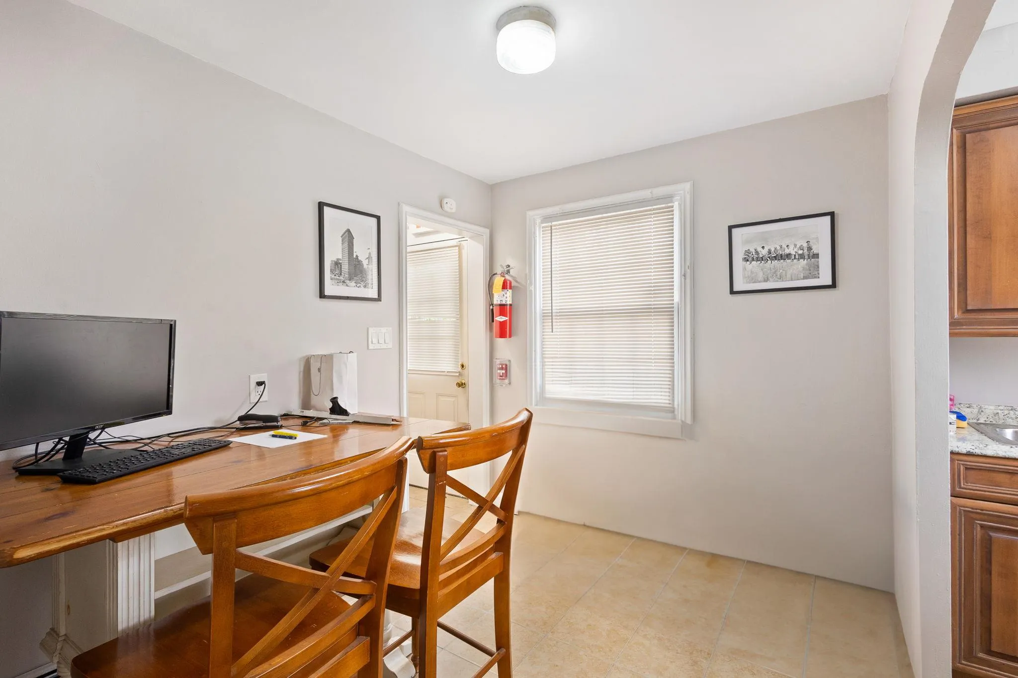 Office space with light tile patterned flooring Office space with light tile patterned flooring